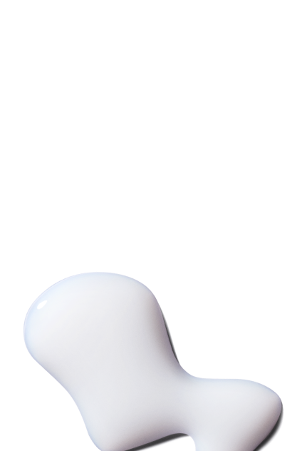Primo piano di una texture cremosa bianca e ricca, che illustra un prodotto per capelli nutriente.