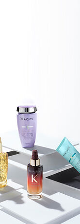 Quattro prodotti per capelli Kerastase in un layout moderno su sfondo bianco, evidenziando eleganza e cura.