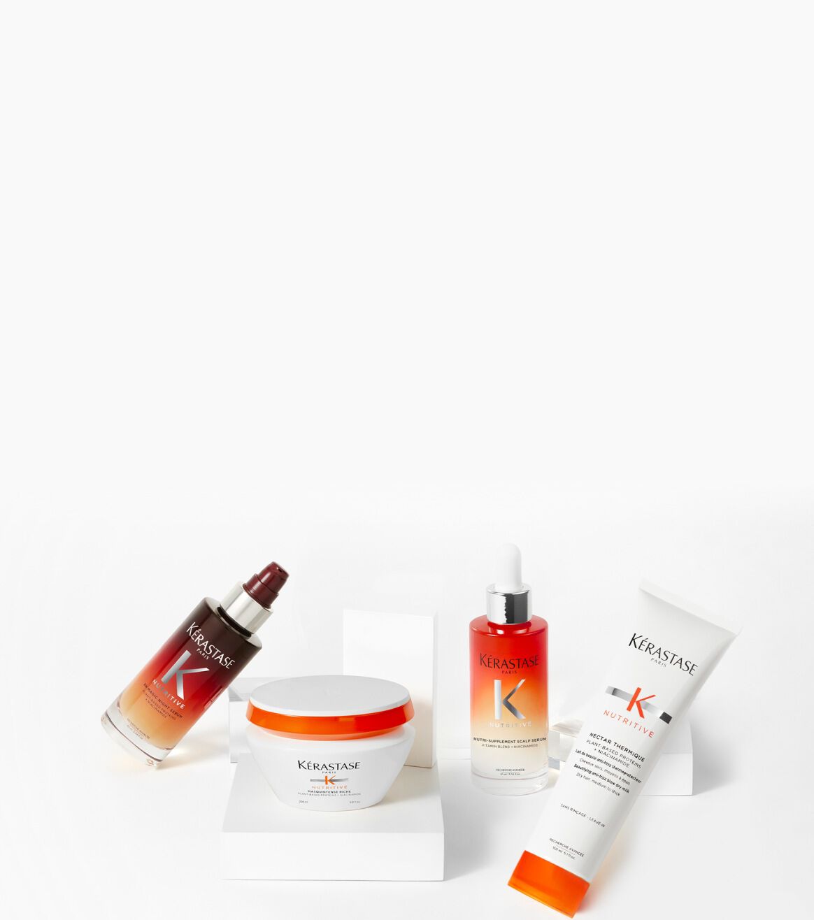 La gamma Nutritive su un piedistallo in vetro.