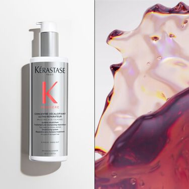 Il concentre decalcifiant ultra-reparateur premiere Kerastase e posizionato su una base. 