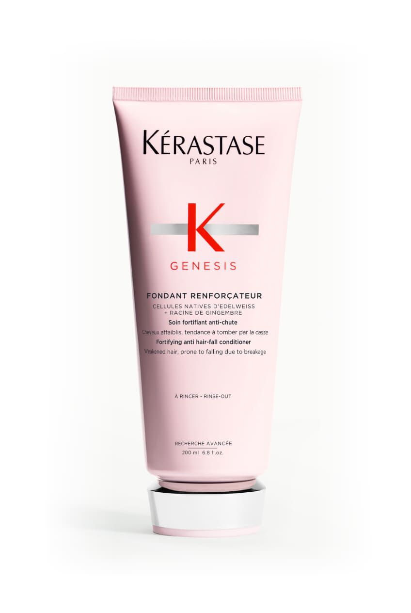 Tubo rosa del balsamo Kerastase Genesis Fondant Renforcateur.