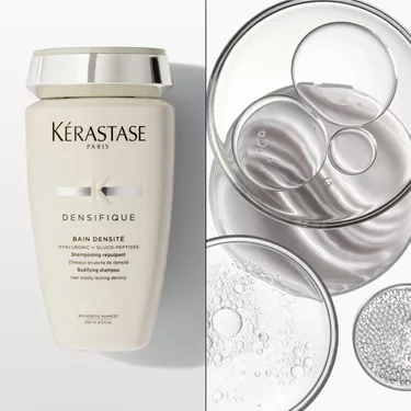 El bain densite Densifique Kerastase se coloca sobre una superficie blanca.