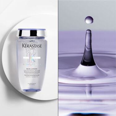 Il bain blond absolu Kerastase e posizionato su un supporto rotondo bianco.