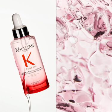 il serum fortifiant genesis anti-chute sospeso nell'aria con fiori rosa pallido