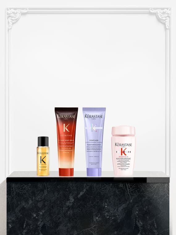 Quattro prodotti Kerastase in formato miniatura in mostra: l'olio Elixir Ultime, il Nutritive Magic Night Serum, il trattamento Cicaflash della linea Blond Absolu e un prodotto della gamma Kerastase Genesis.