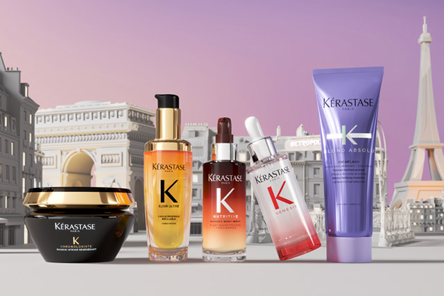 Prodotti haircare Kérastase su sfondo parigino, inclusi un maschera, sieri e trattamenti per capelli.