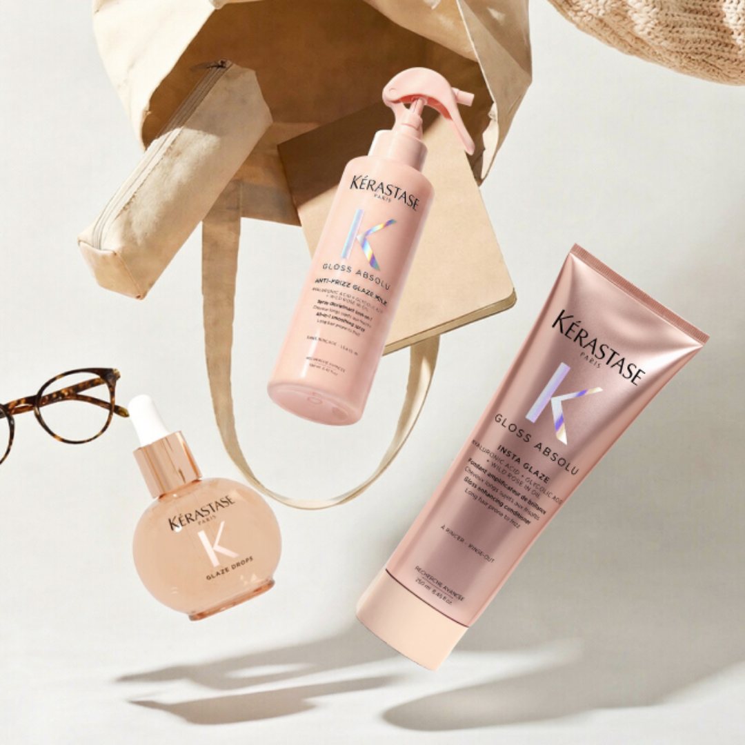 I prodotti della linea Gloss Absolu escono da una borsa di paglia e sono sospesi in aria. 